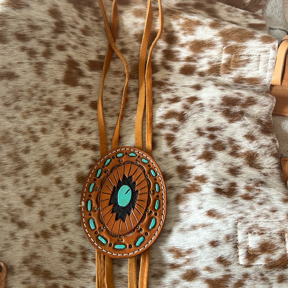 Allie Falcon custom leather bolo